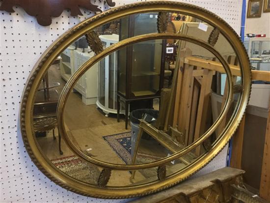 Oval gilt frame mirror